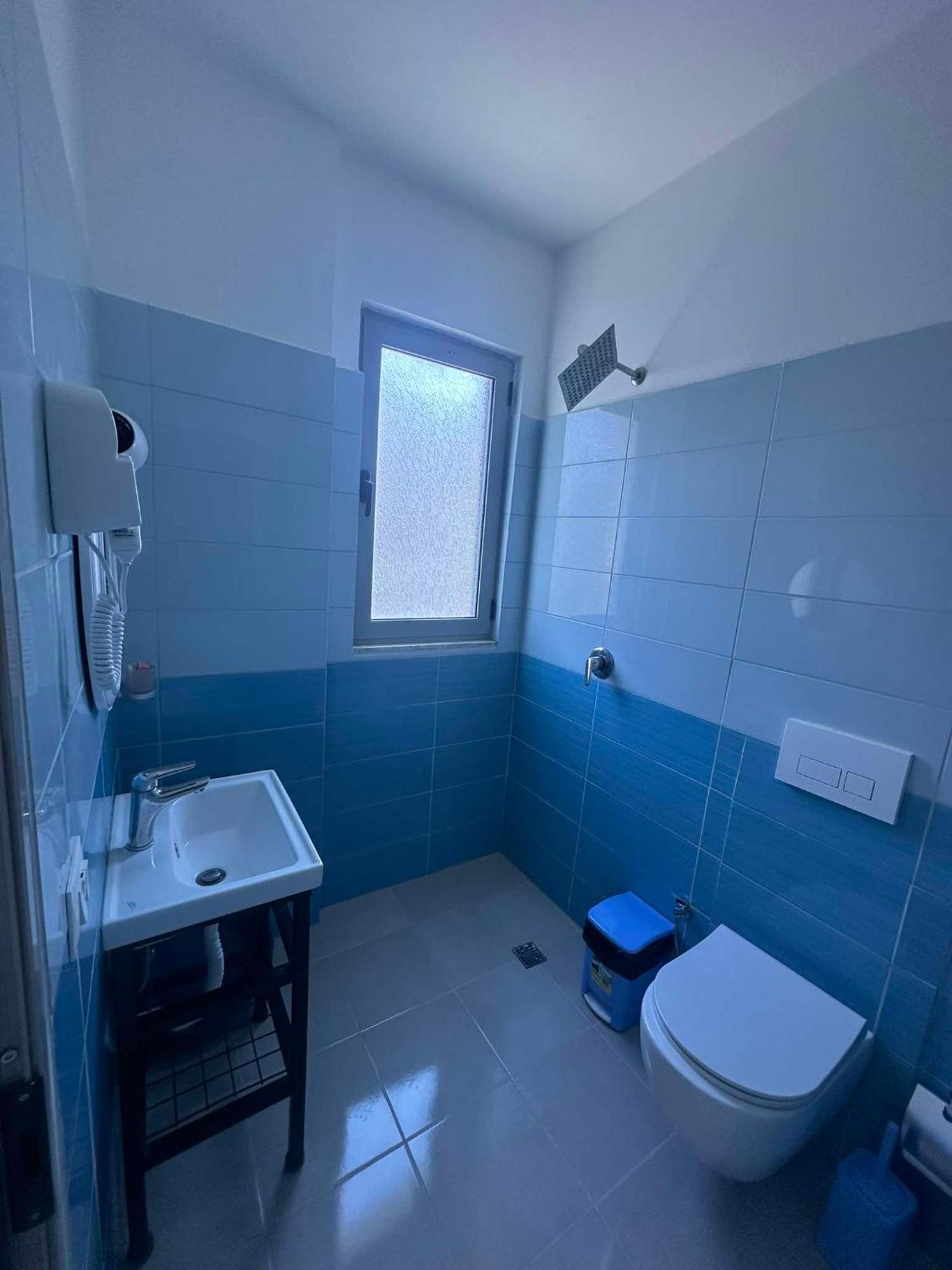 Deor Hotel Shengjin Bagian luar foto